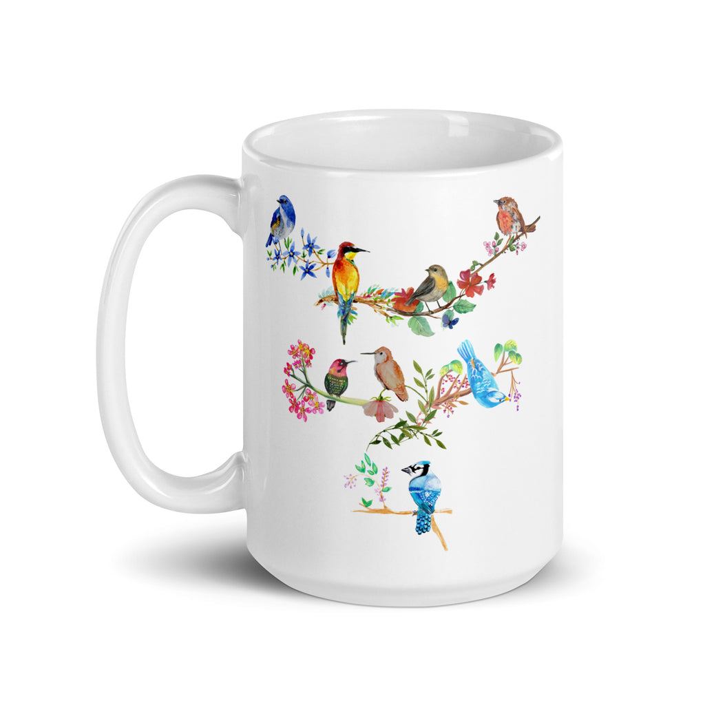 15 ounce white mug with a hand-painted design of various garden birds