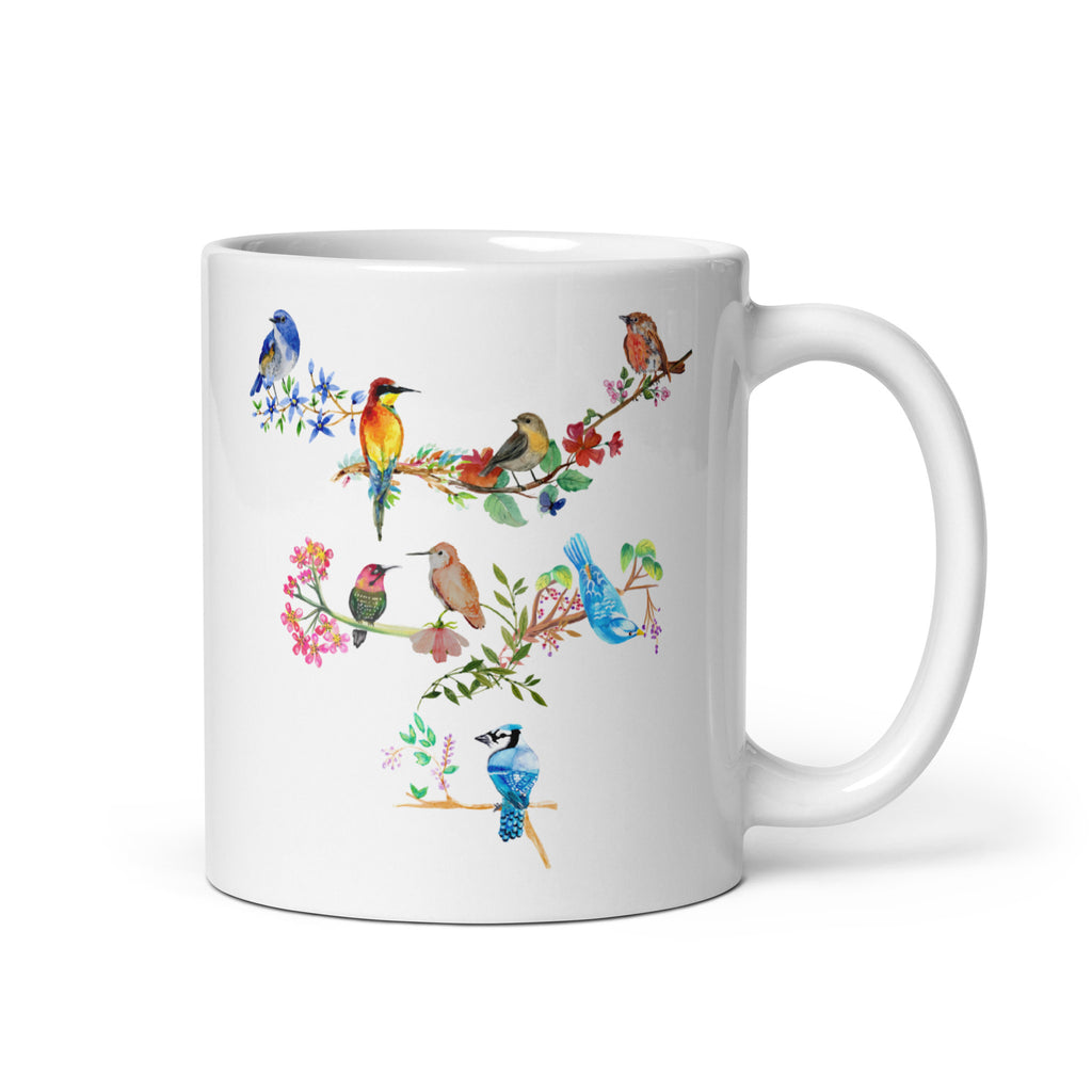 11 ounce white mug with a hand-painted design of various garden birds