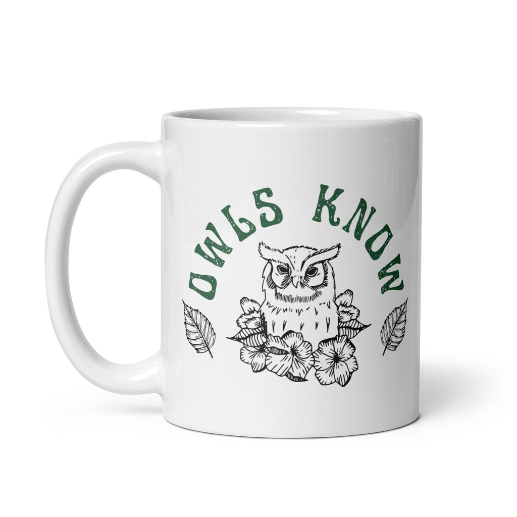 11 ounce ceramic mug featuring an owl surrounded by flowers and the words "Owls Know"